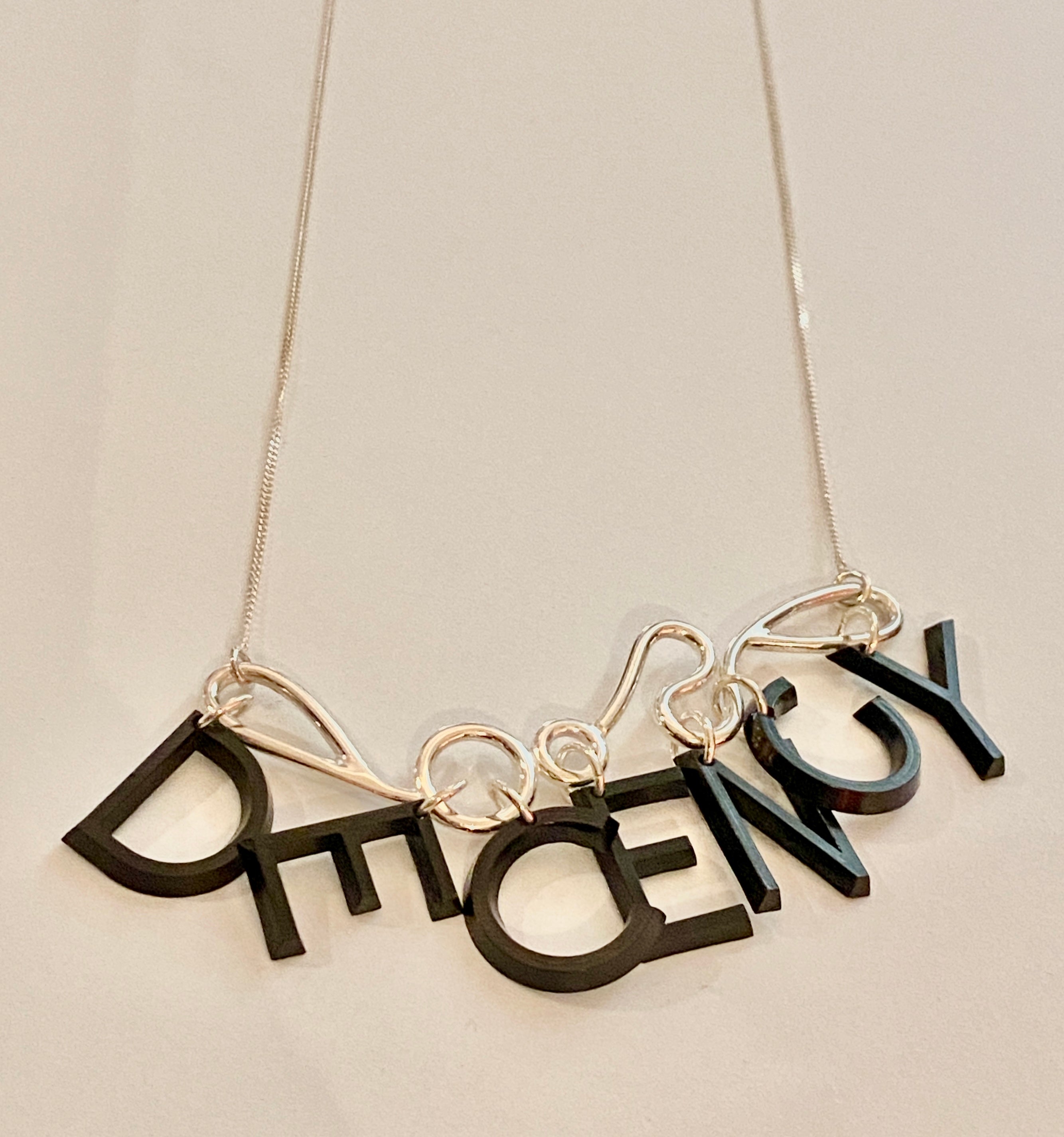 DECENCY silver and plastic necklace