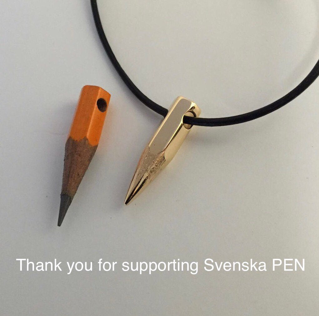 18K gold pendant on a leather strand, hollow and cast from a real pencil. The one next to the pendant!