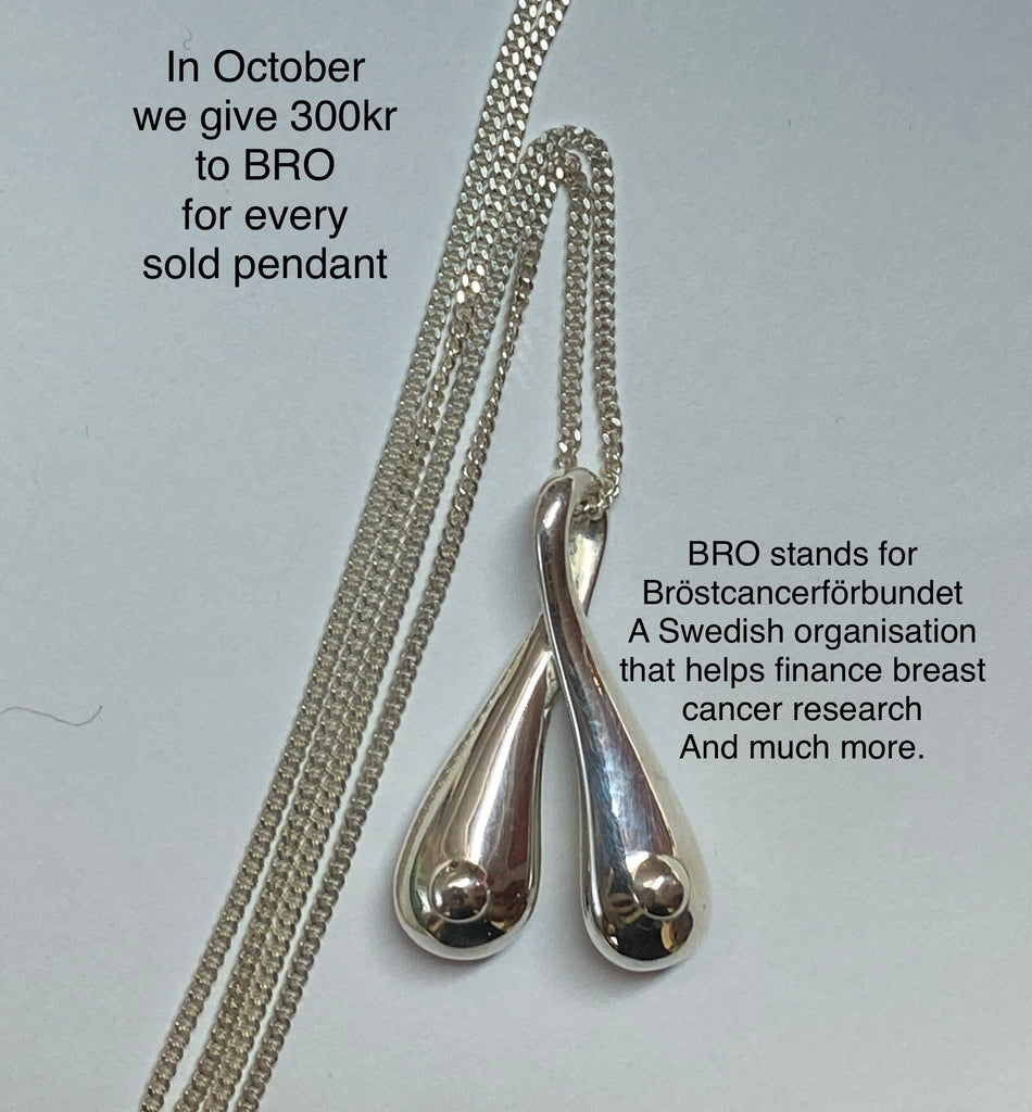 Silver Boobs on a 70 cm long sterling silver curb chain